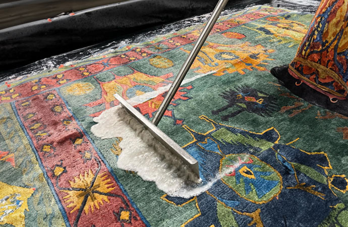 Professional cleaning service restoring water-damaged carpet to its original condition